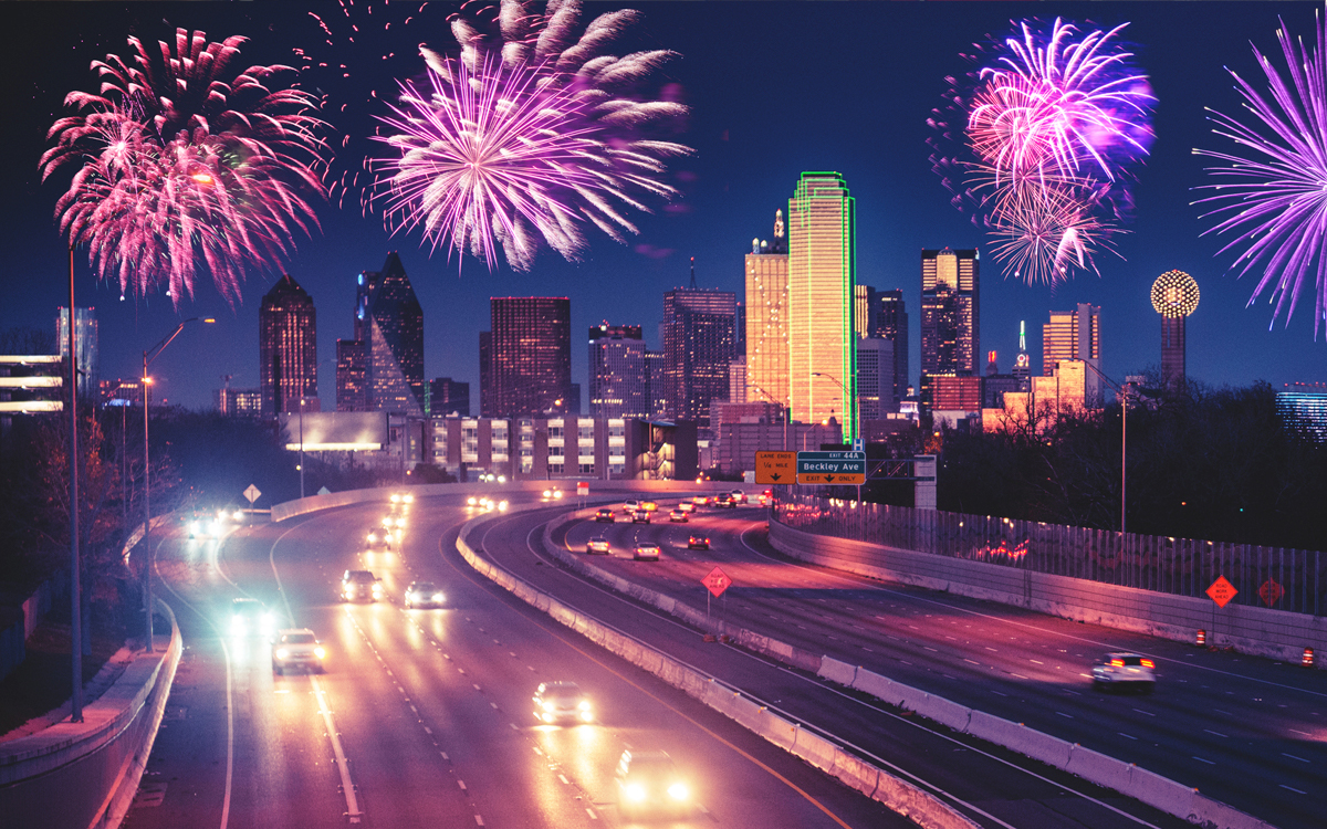 Fireworks, city skyline, cars on interstate Fireworks, city skyline, cars on interstate
