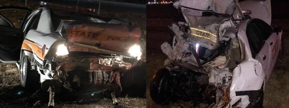 Two police cars with severe damage Two police cars with severe damage