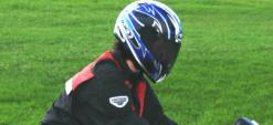 Motorcyclist wearing a helmet